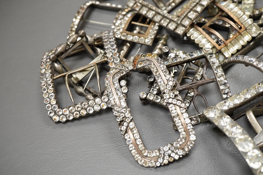 A large collection of shoe buckles, 18th-19th century, of rectangular outline, set with pastes, mostly mounted in steel, a minority in silver, some with later brooch fittings